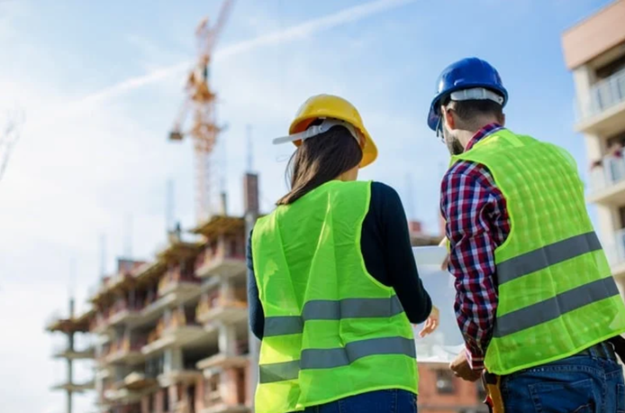 engineer hard hat clipboard inspection